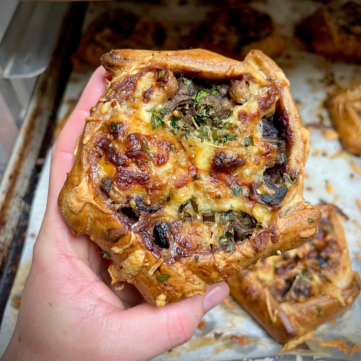 Baked Bean Galette w/ English Peas, Zucchini, Sweet Peppers, Caramelized Leeks & Ricotta