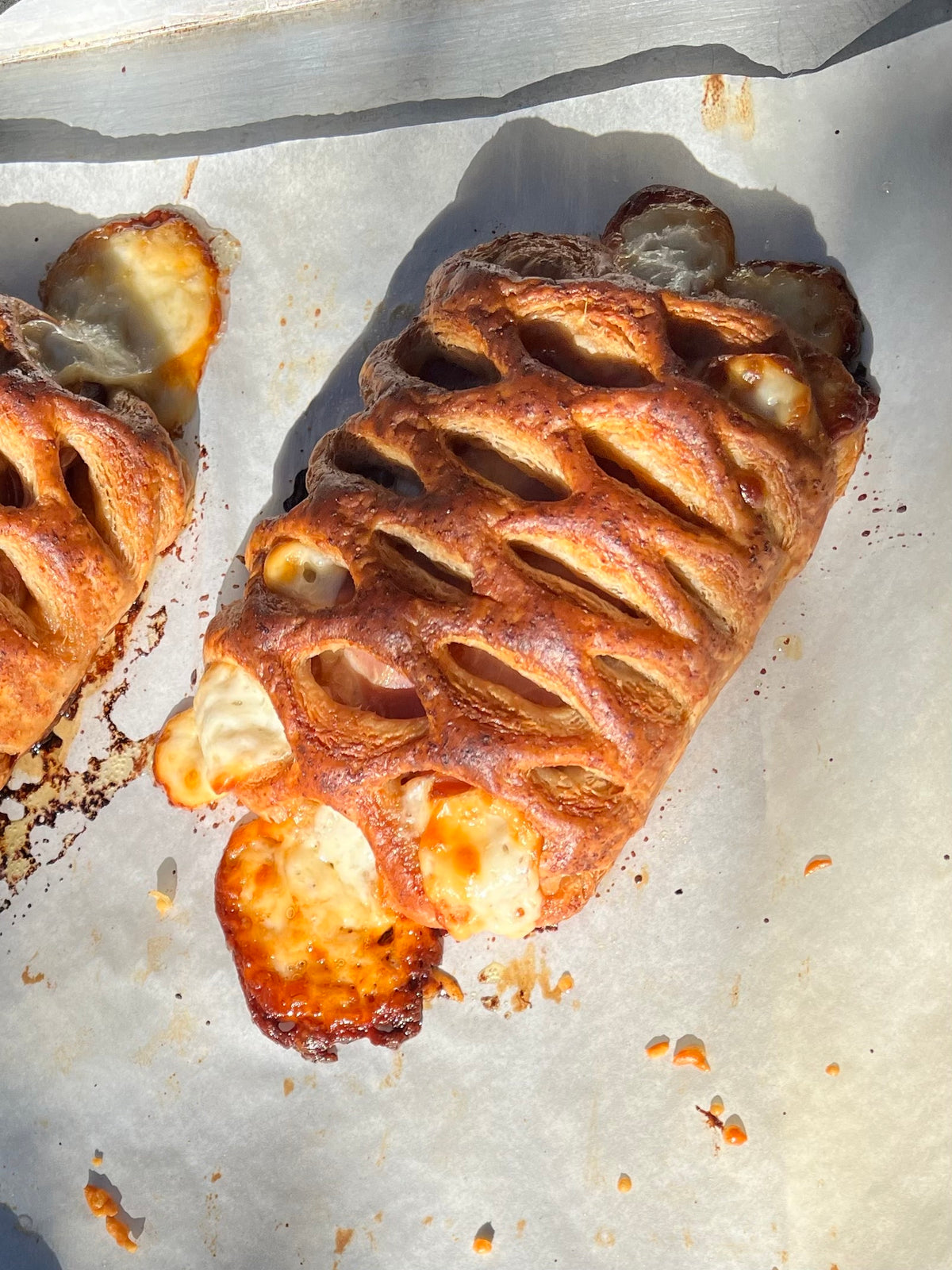 Sausage Croissant w/ Beaufort & White Cheddar